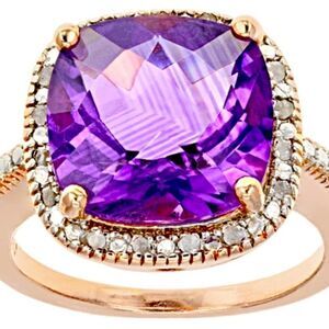 Size 9 cushion cut Amethyst with .10 of white diamonds . 14k rose gold